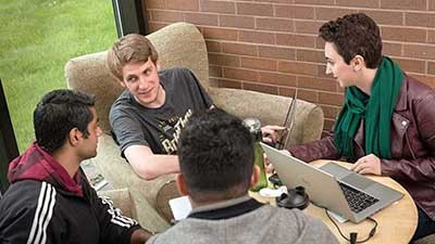 Students working together in a lounge