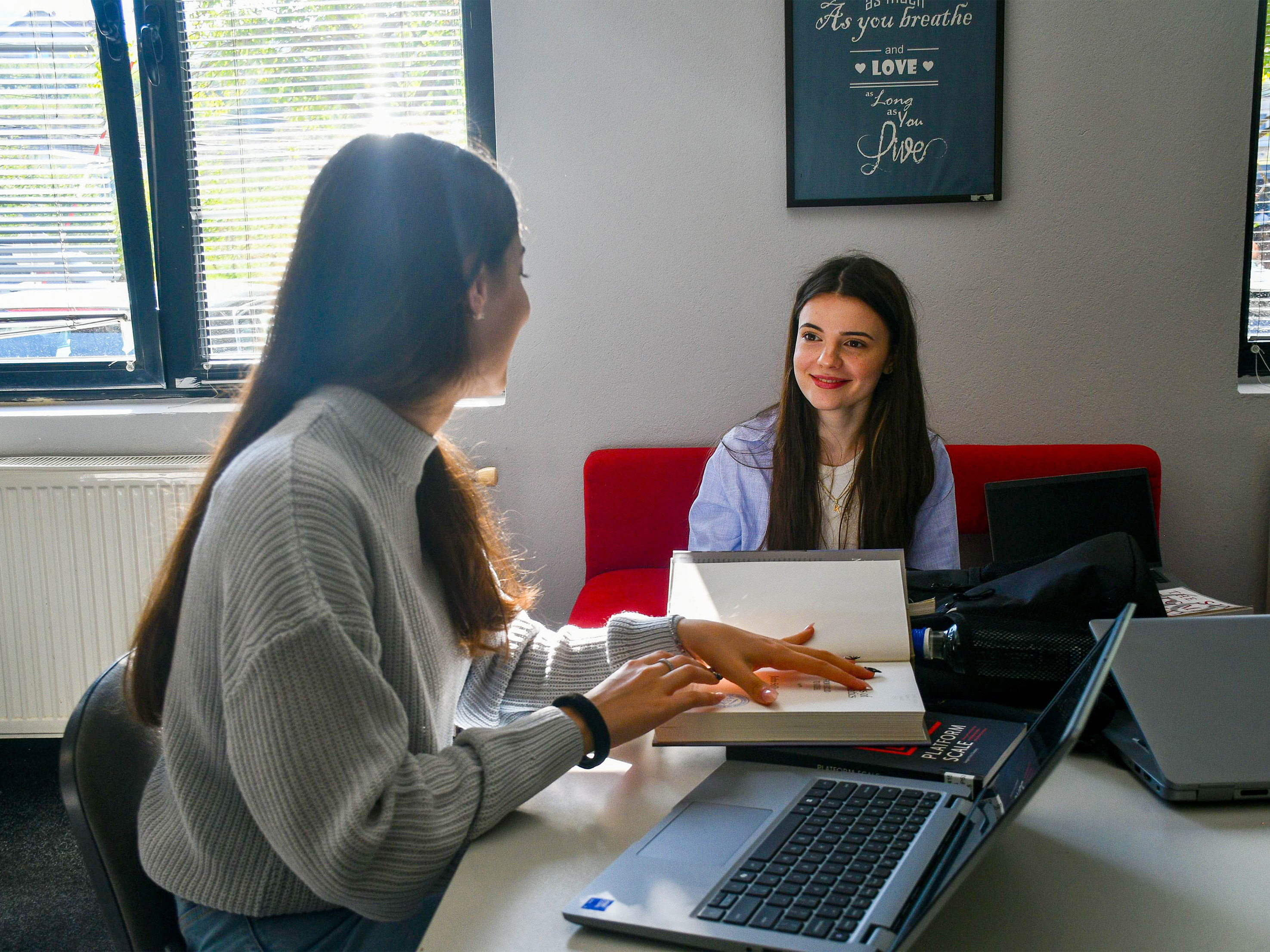 photo of students at the library 
